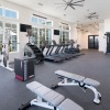 fitness center with ample lighting throughout